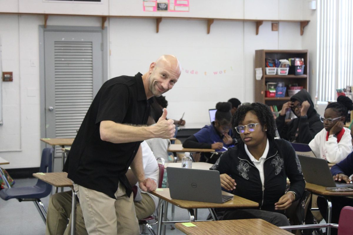 THIRD PERIOD: Here is Mr. Morehouse  helping his student, Gelina Tisma, with an assignment.