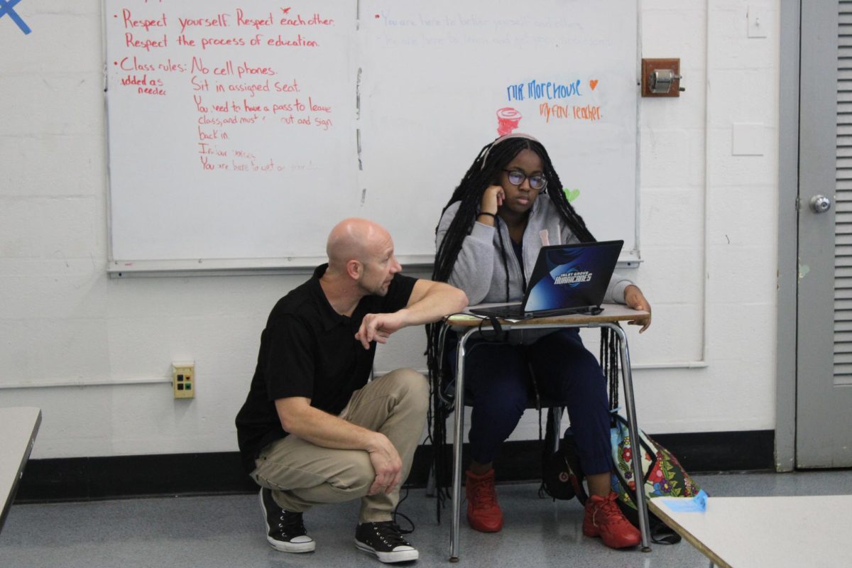 GUIDANCE: Here is Mr. Morehouse helping Kelis Cureton with the lesson of the day.