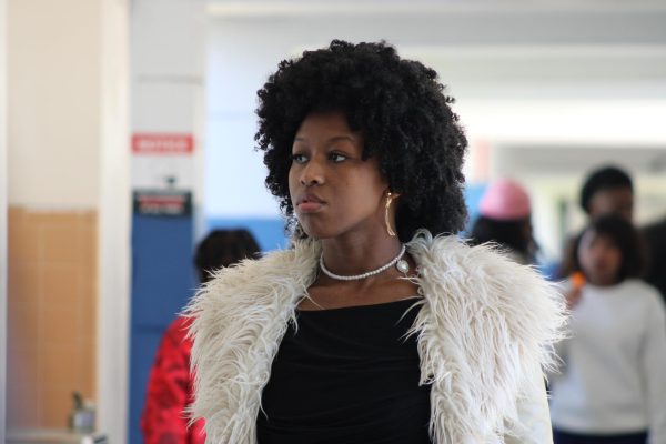 ADVOCATING VOICES: Students like Brina Brown, a sophomore in the Medical Academy, put themselves into the shoes of prominent black leaders, such as Aretha Franklin, in commemoration of the second day of Spirit Week. 