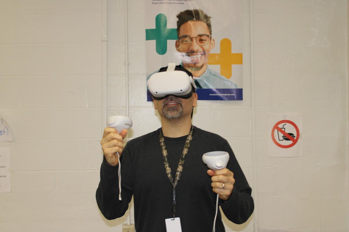 THE REALITY: Mr. Martinez with VR Headset on.