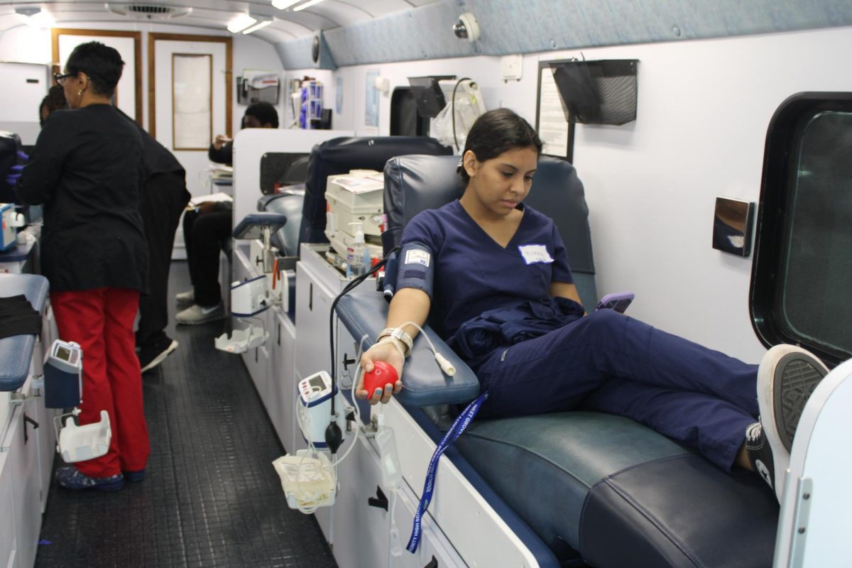 CIRCULATION: Ashely Acosta, a sophomore in the Medical Academy, donating blood at todays Blood Drive; 1 pint saves 3 lives.