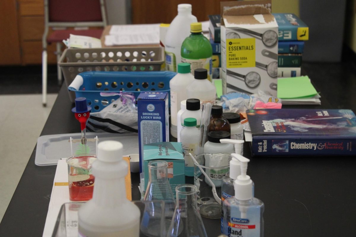 THE CHEM IN CHEMISTRY: A whole host of bottles and boxes that are used for experiments on the big table.