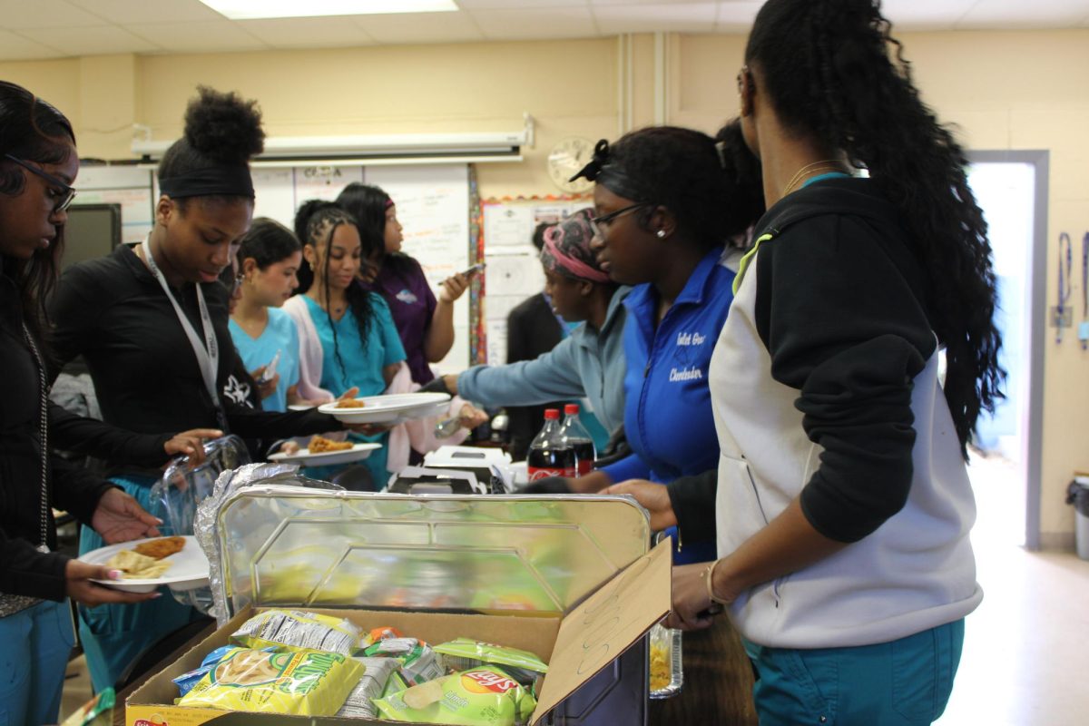 FEAST OF THANKS: The Senior Medical class decides to host their own Thanksgiving, sharing food, gratitude, and good company. 