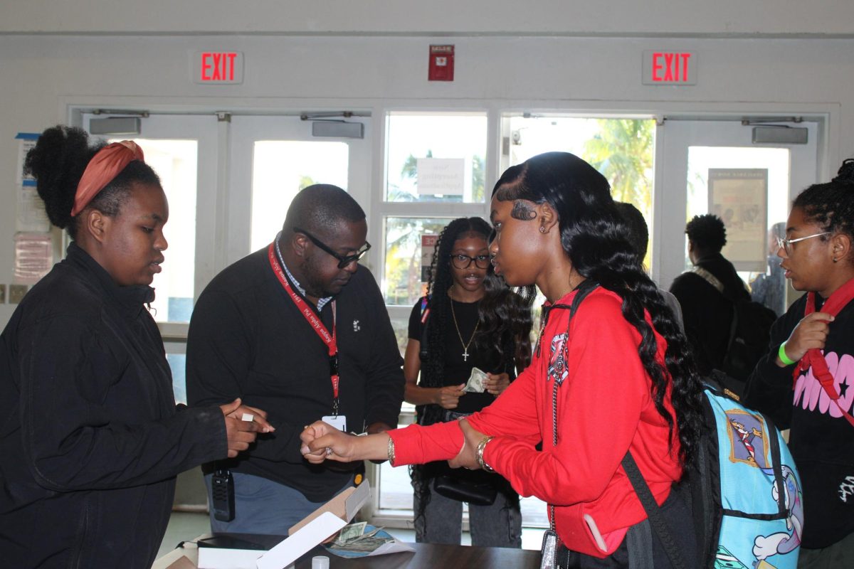 DRESS OUT: Students showing support by giving a dollar to help clubs.