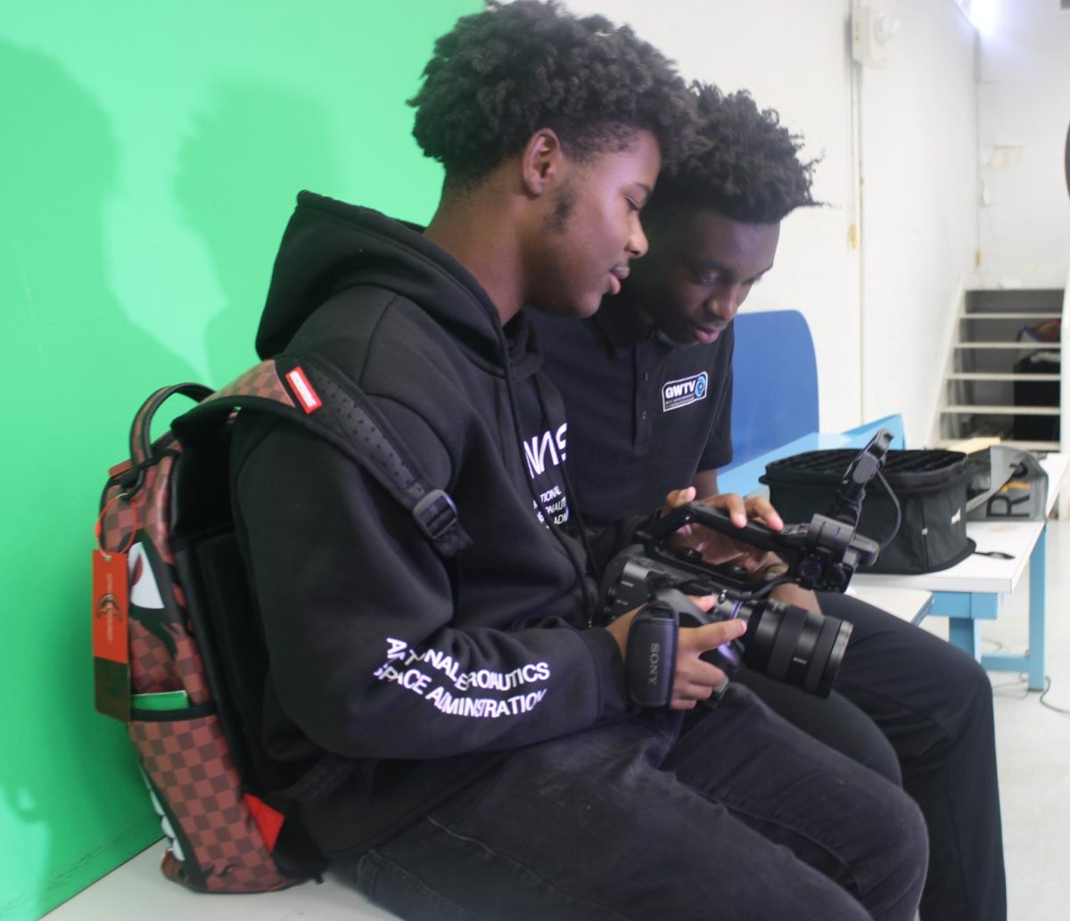 A SECOND OPINION: To make sure he captured the best results, Samuel Bent-Myers  shows the footage to Jordan Cajilus in case he had to re-film. 
