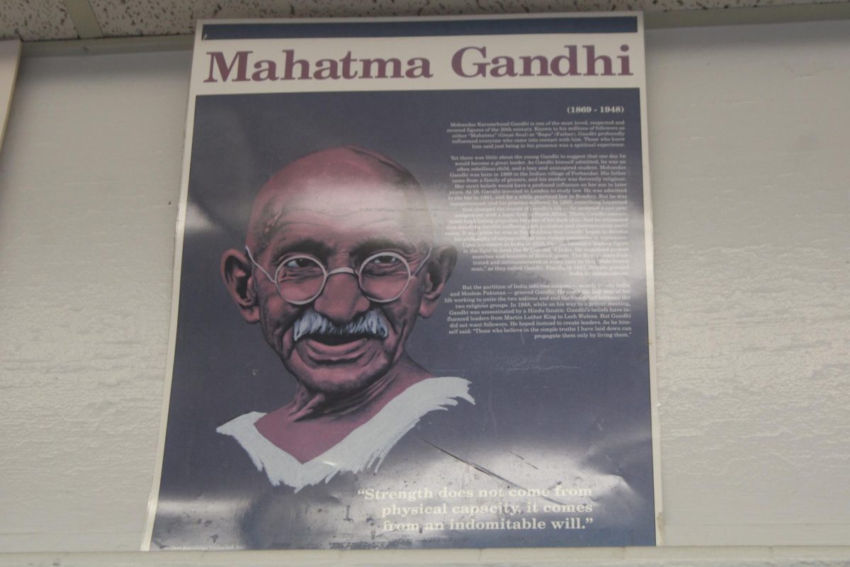 INDOMITABLE WILL: Mr. Pauletti's poster of Gandhi, an Indian lawyer known for his philosophy of nonviolence that inspired numerous civil rights activists.