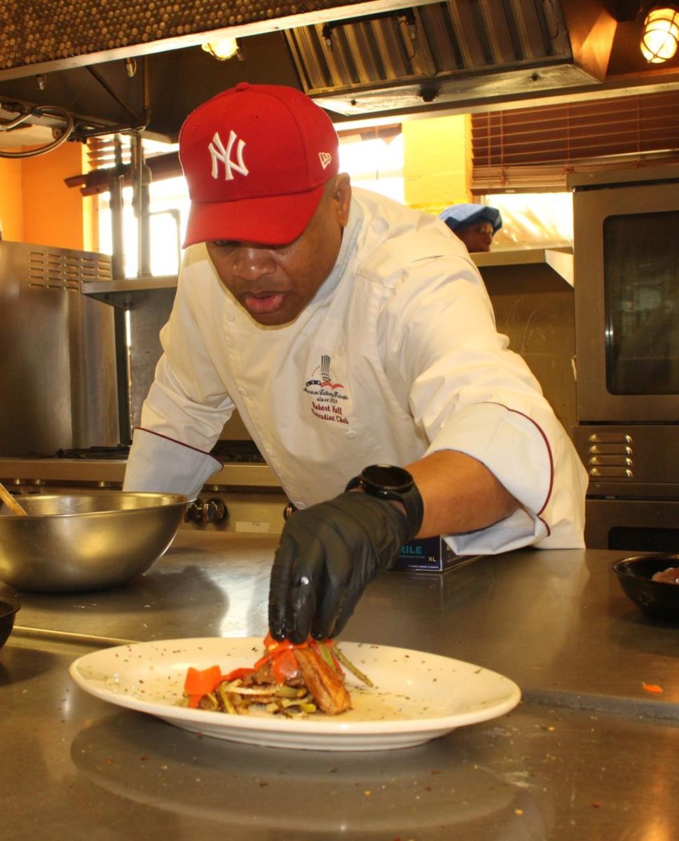 LAST TOUCH:  Chef Hall's final move to execute this fine dish was stacking it together.   