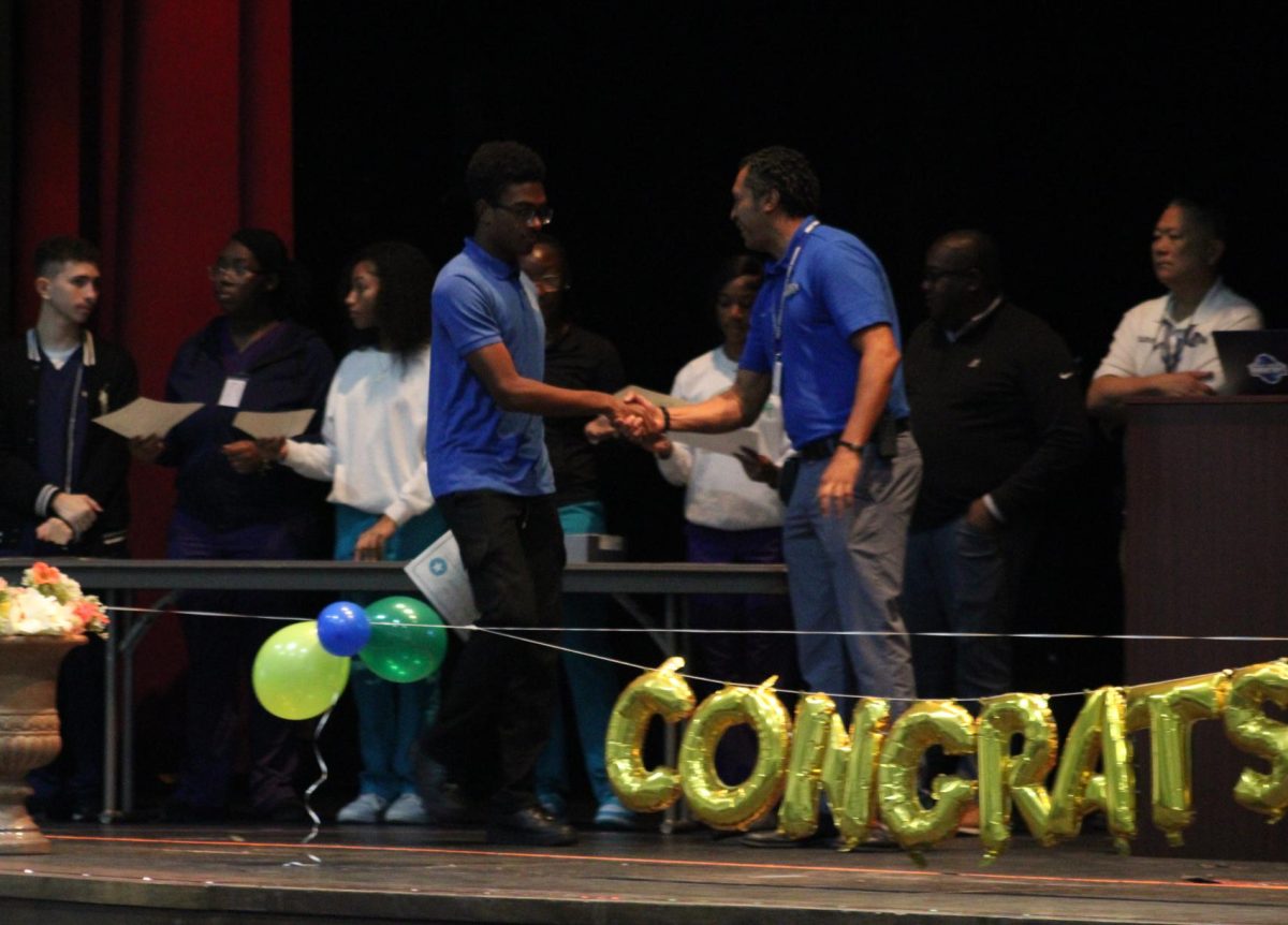 PERSISTENCE: Inlet Grove students were celebrated for their outstanding academic achievements on Feb. 7. Those who earned straight A's and B's were recognized for their dedication and commitment to excellence, with parents there to celebrate their success.