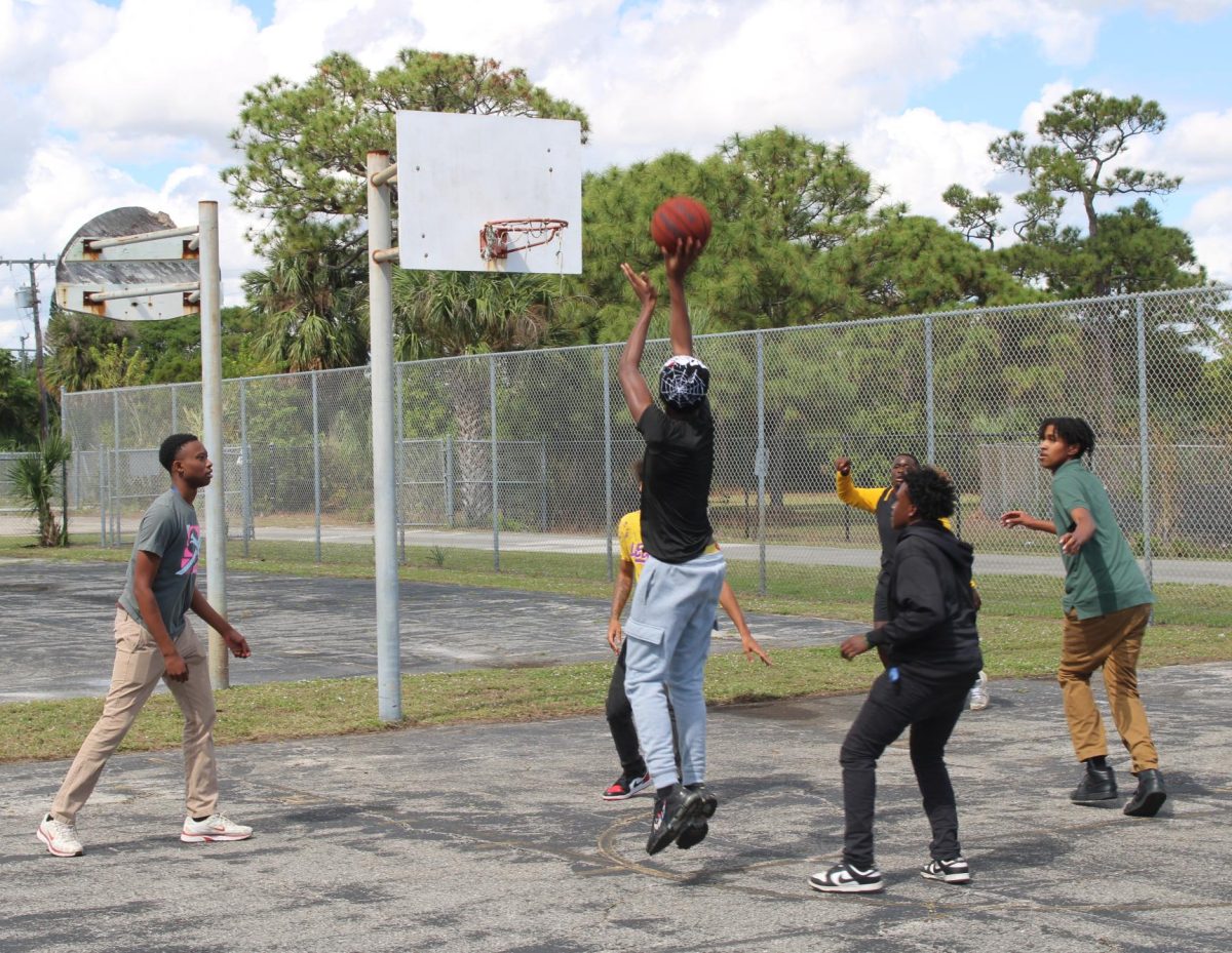 HOOPING FOR FUN: During lunch, students can come to the court outside of the gym to play basketball, football, soccer, and more.