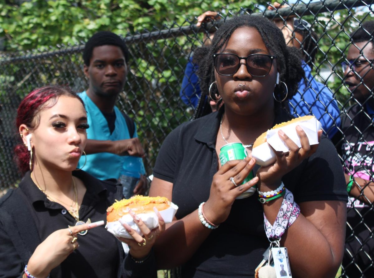 FUEL UP: Students join together during lunch to enjoy churros and hot dogs. Photographed above are Seniors Sofia Restrepo on the left  and Devin Bradford on the right.