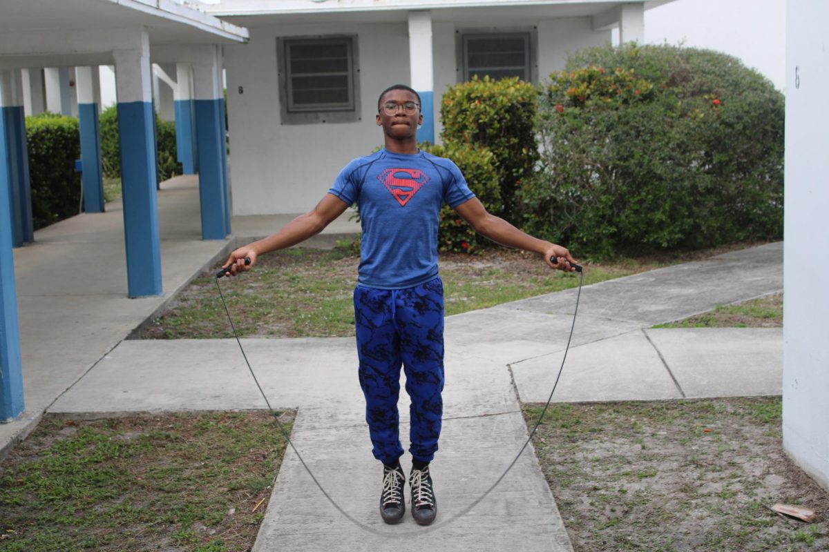 GET PUMP: Emmanuel Banks, a student in Coach Donavan’s class does jump roping as one of his workouts during 4th period. 