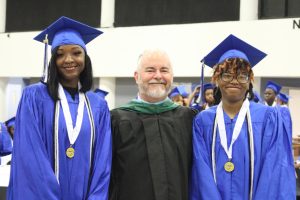 A CELEBRATION: After four years, the class of 2025 has officially walked the stage on May 13, 2025. Photographed above are Doriska Blaze, Scott Mcdermott, and Miracle Cooper (from left to right).