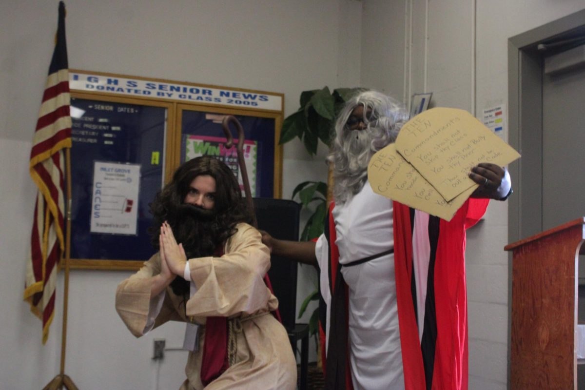 HOLY MONDAY: For the first day of spirit week Ms. Sullivan (on the left)  and Mr. Baker came in with pep in their step.