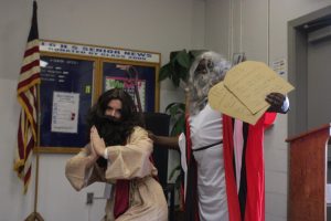 HOLY MONDAY: For the first day of spirit week Ms. Sullivan (on the left)  and Mr. Baker came in with pep in their step.
