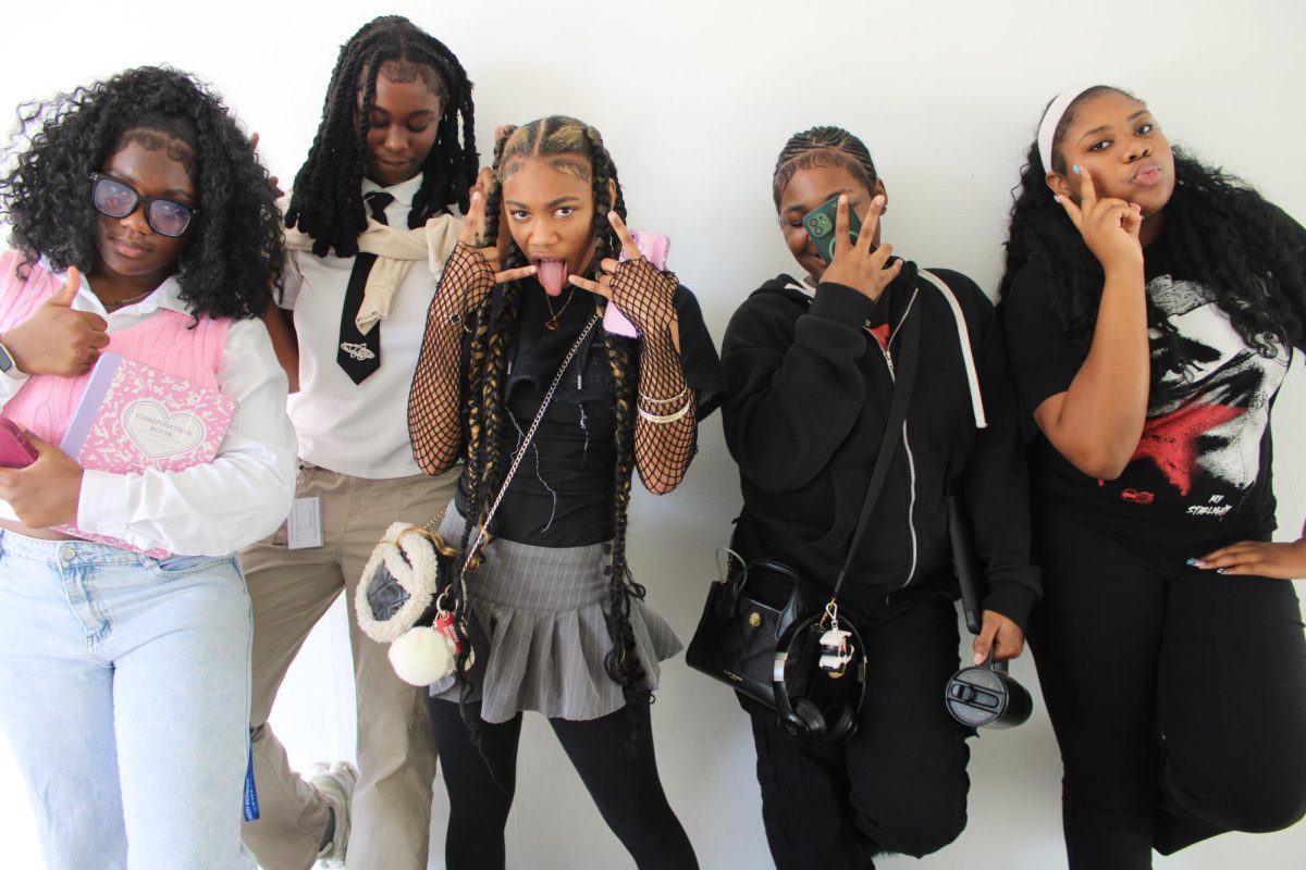 DRESS OUT : Falisha Oliantus, Minayah Rankin, Destiny Talegrand, and Atira Thicklin participated in Emo vs Preppy Day, highlighting styles from preppy looks to emo outfits.