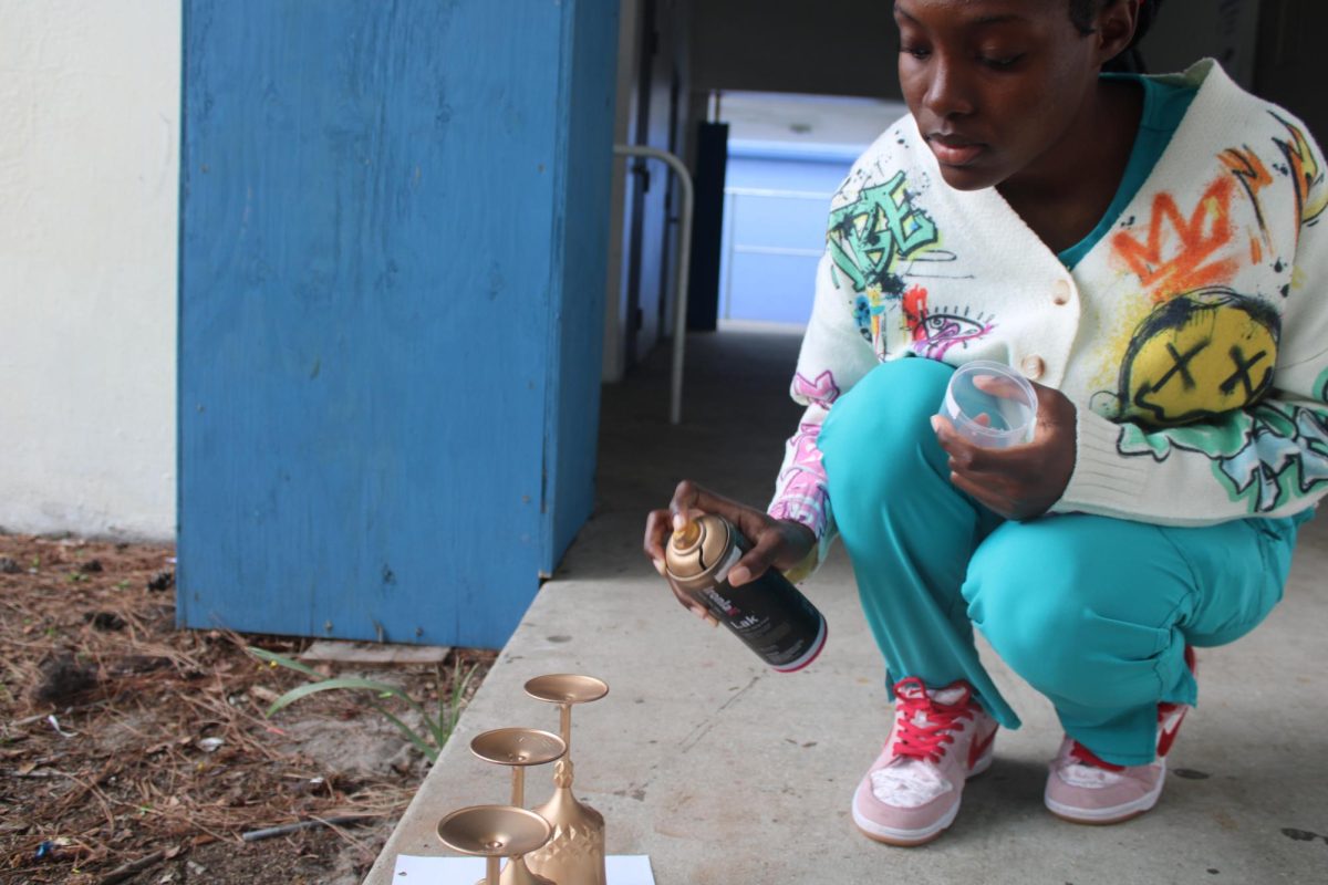 Student Yaleisha Civil working on the center pieces for this year’s homecoming (Theme: Arabian night)