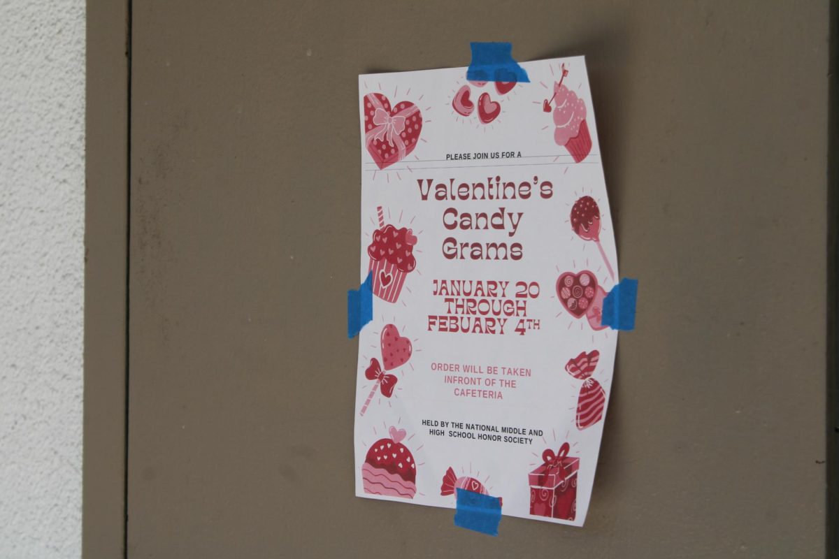 VALENTINE'S REMINDER: A colorful poster in the halls promotes a Candy Gram fundraiser. 