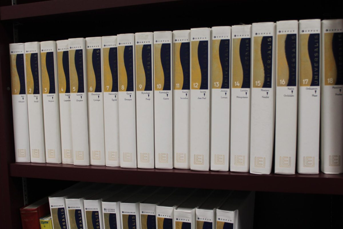 ORGANIZED: Matching books are arranged neatly.