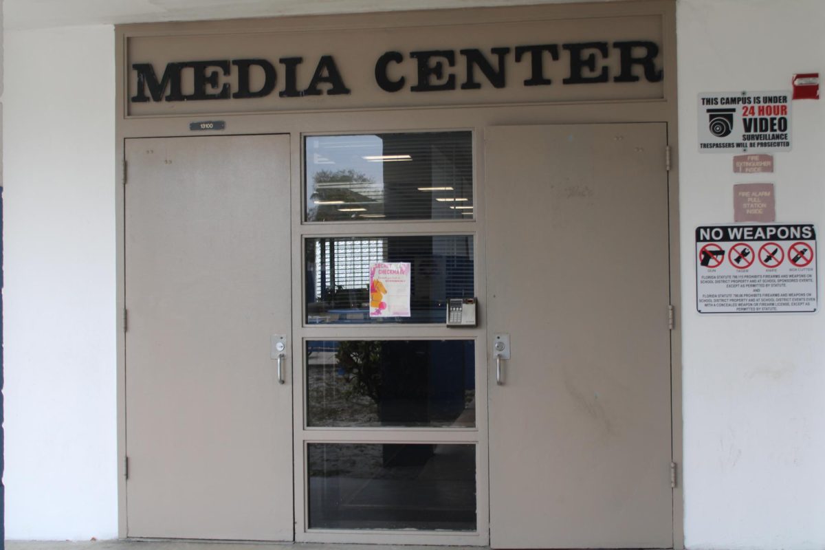 MEDIA CENTER: The entrance to the media center stands closed between classes.