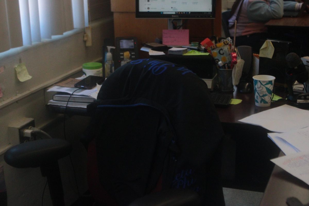 UP CLOSE:Take a look behind the desk and the sweater on the chair.