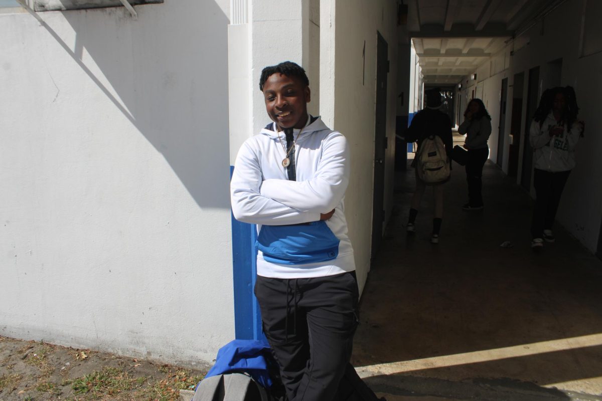 SAY CHEESE: A student stops for a quick photo before stepping onto to the court, which is free to join.