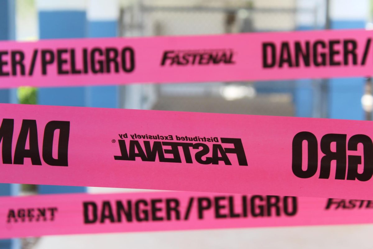 CAUTION: Take a look at the tape alerting students of destruction ahead.