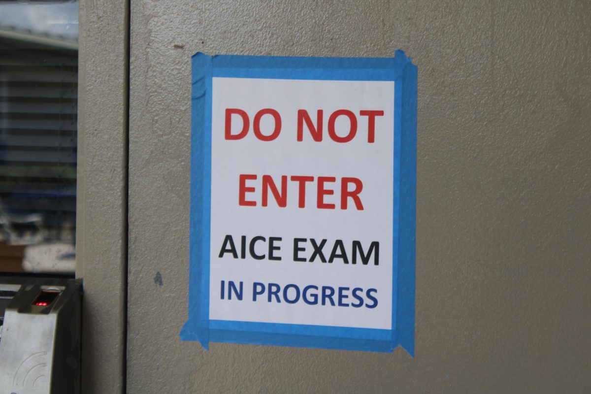 QUIET ON SET: AICE exams are taken place in the Media Center.